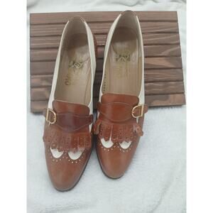 vintage Salvatore Ferragamo brogue fringe saddle with ivory flats in size 7